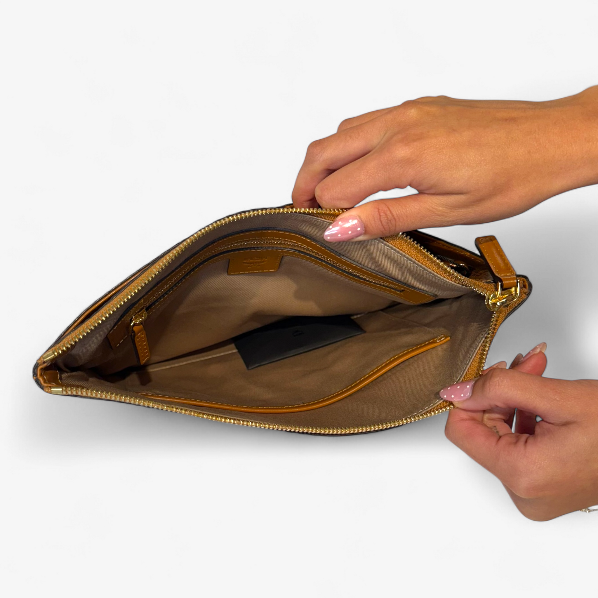 MCM Brown Monagrammed Clutch Crossbody